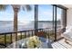 Condo boasts amazing water views from its comfortable seating area at 1602 Stickney Point Rd # 1602-301, Sarasota, FL 34231