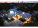 Stunning aerial view of a modern home, showcasing its unique architecture and landscaping at 1608 80Th Nw St, Bradenton, FL 34209