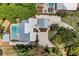 Aerial view showcasing the home's layout, pool, and surrounding landscape at 1608 80Th Nw St, Bradenton, FL 34209