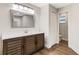 Bathroom with modern vanity, a walk-in shower, and toilet at 1608 80Th Nw St, Bradenton, FL 34209