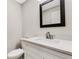 Updated bathroom with modern vanity, quartz countertop, and frameless shower at 1608 80Th Nw St, Bradenton, FL 34209