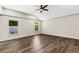 Spacious bedroom with hardwood floors and ceiling fan at 1608 80Th Nw St, Bradenton, FL 34209