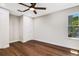 Well-lit bedroom featuring hardwood floors and ample closet space at 1608 80Th Nw St, Bradenton, FL 34209