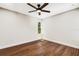 Bright bedroom with hardwood floors and ceiling fan at 1608 80Th Nw St, Bradenton, FL 34209