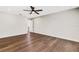 Spacious bedroom with hardwood floors and ceiling fan at 1608 80Th Nw St, Bradenton, FL 34209