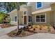 Modern house exterior with landscaped walkway and garden at 1608 80Th Nw St, Bradenton, FL 34209