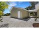 Detached storage shed with white door at 1608 80Th Nw St, Bradenton, FL 34209