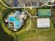 Community pool, basketball court, and sand volleyball court at 16135 Paynes Mill Dr, Bradenton, FL 34211