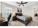 Cozy bedroom with a workspace and built in shelving at 16135 Paynes Mill Dr, Bradenton, FL 34211