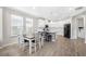 Kitchen dining area with a table for four and adjacent to the kitchen at 16135 Paynes Mill Dr, Bradenton, FL 34211