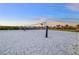 Sand volleyball court with net and posts at 16135 Paynes Mill Dr, Bradenton, FL 34211