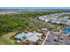 Aerial view of community amenities including pool, playground, and basketball court at 16439 Slate Pl, Bradenton, FL 34211