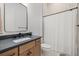 Clean bathroom with single vanity and shower/tub combo at 16439 Slate Pl, Bradenton, FL 34211