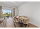 Casual dining area with a wood table and beige chairs at 16439 Slate Pl, Bradenton, FL 34211