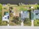 Aerial view of canal-front property with pool and large backyard at 2146 Como St, Port Charlotte, FL 33948