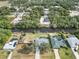 Wide aerial view of canal-front home, showcasing the surrounding neighborhood at 2146 Como St, Port Charlotte, FL 33948