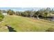 Large grassy backyard with canal access at 2146 Como St, Port Charlotte, FL 33948