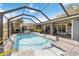 Relaxing screened pool and spa, perfect for entertaining and relaxation at 2146 Como St, Port Charlotte, FL 33948