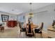 Mid century modern dining area with unique chairs and decor at 2416 Amherst Ave, Bradenton, FL 34207