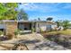 Single-story home with a covered entryway and mature landscaping at 2416 Amherst Ave, Bradenton, FL 34207