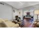 Spacious living room featuring hardwood floors and stylish mid-century modern furniture at 2416 Amherst Ave, Bradenton, FL 34207