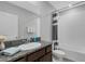 Clean bathroom with granite countertop, tub, and shower at 2471 Midnight Pearl Dr, Sarasota, FL 34240