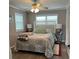 Primary bedroom with king-size bed and light-grey flooring at 2601 Gulf N Dr # 528, Bradenton Beach, FL 34217