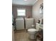 Laundry room with washer, dryer, and toilet at 2601 Gulf N Dr # 528, Bradenton Beach, FL 34217