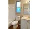 Clean bathroom with white vanity, bathtub, and tile flooring at 320 Cardinal Rd, Venice, FL 34293