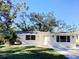 Newly renovated single-story home with a well-maintained lawn at 320 Cardinal Rd, Venice, FL 34293