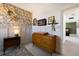 Bedroom with floral wallpaper and changing table at 3324 Big Sky Way, Lakewood Ranch, FL 34211