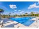 Large community pool with plenty of lounge chairs at 3324 Big Sky Way, Lakewood Ranch, FL 34211