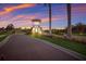 Community entrance with guard house at sunset at 3324 Big Sky Way, Lakewood Ranch, FL 34211