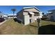 Exterior view of home with storage and AC unit at 3333 26Th E Ave # 1150, Bradenton, FL 34208