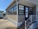 View of home's front entrance and stairway at 3333 26Th E Ave # 1150, Bradenton, FL 34208