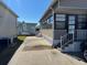 Exterior view showing home's facade and landscaping at 3333 26Th E Ave # 1150, Bradenton, FL 34208