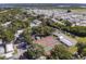 Aerial view showing community amenities including tennis courts and pool at 3333 26Th E Ave # 1155, Bradenton, FL 34208