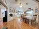 Bright dining area with white table and chairs, adjacent to kitchen at 3333 26Th E Ave # 1155, Bradenton, FL 34208