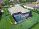 Aerial view of home with pool and cabana at 3354 Founders Club Dr, Sarasota, FL 34240