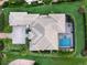 Bird's-eye view of house, pool, and landscaping at 3354 Founders Club Dr, Sarasota, FL 34240