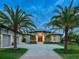 Home exterior at dusk showcasing architectural details at 3354 Founders Club Dr, Sarasota, FL 34240