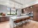 Modern kitchen with white island, stainless steel appliances, and ample counter space at 3354 Founders Club Dr, Sarasota, FL 34240