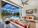 Outdoor patio with seating area and pool view at 3354 Founders Club Dr, Sarasota, FL 34240