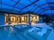 Relaxing pool and spa area under a covered lanai at 3354 Founders Club Dr, Sarasota, FL 34240