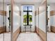 Large walk-in closet featuring ample storage space and natural light at 3354 Founders Club Dr, Sarasota, FL 34240