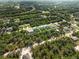 Aerial view of a residential neighborhood with new construction homes at 3397 Dryden St, North Port, FL 34288