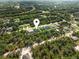 Aerial view of a home in a residential neighborhood at 3397 Dryden St, North Port, FL 34288