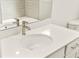 Modern bathroom vanity with quartz countertop and brushed nickel faucet at 3397 Dryden St, North Port, FL 34288