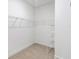 Spacious walk-in closet with wire shelving and hanging rods at 3397 Dryden St, North Port, FL 34288