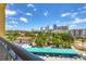 View from a balcony showcasing a city skyline and parking area at 345 Bayshore Blvd # 706, Tampa, FL 33606